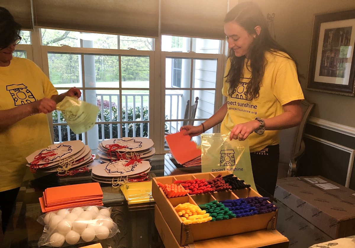 Teagan McCarthy ’22 put together activity kits in March. PHOTO: COURTESY OF MCCARTHY