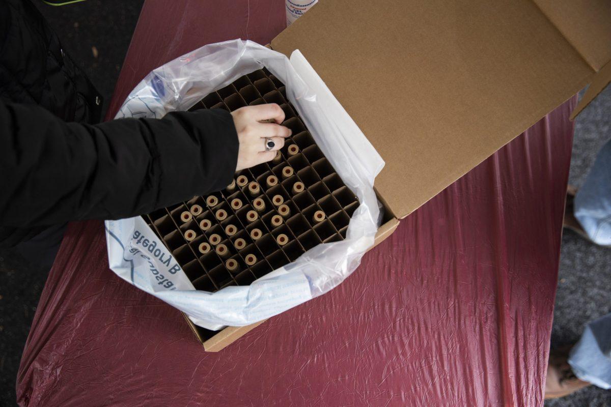 Students dropped their entry test sample into a box for shipping to the Color lab.
PHOTO: MITCHELL SHIELDS ’22/THE HAWK