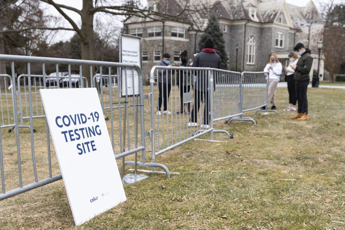 Students wait to get tested for COVID-19 during the spring semester. 