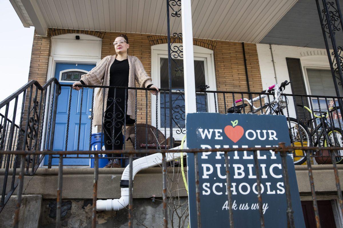 Butler stands outside of her Roxborough home with a sign advocating for Philadelphia’s public schools.
PHOTO: MITCHELL SHIELDS ’22/THE HAWK