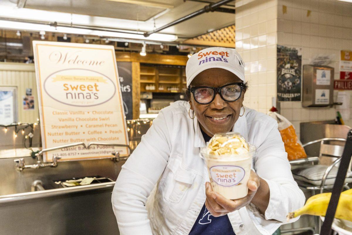 Nina Bryan holds her signature classic banana pudding at her storefront in Reading Terminal Market on Sept. 10. PHOTOS: MITCHELL SHIELDS ’22/THE HAWK
