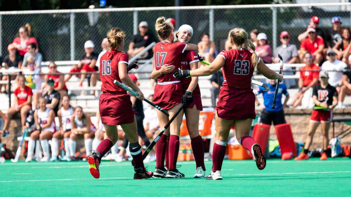 The St. Joe's field hockey team celebrates during their contest against Rutgers University on Sept. 12, 2021
PHOTO: JOE SCHNEYDER/SAY CHEEZE STUDIOS