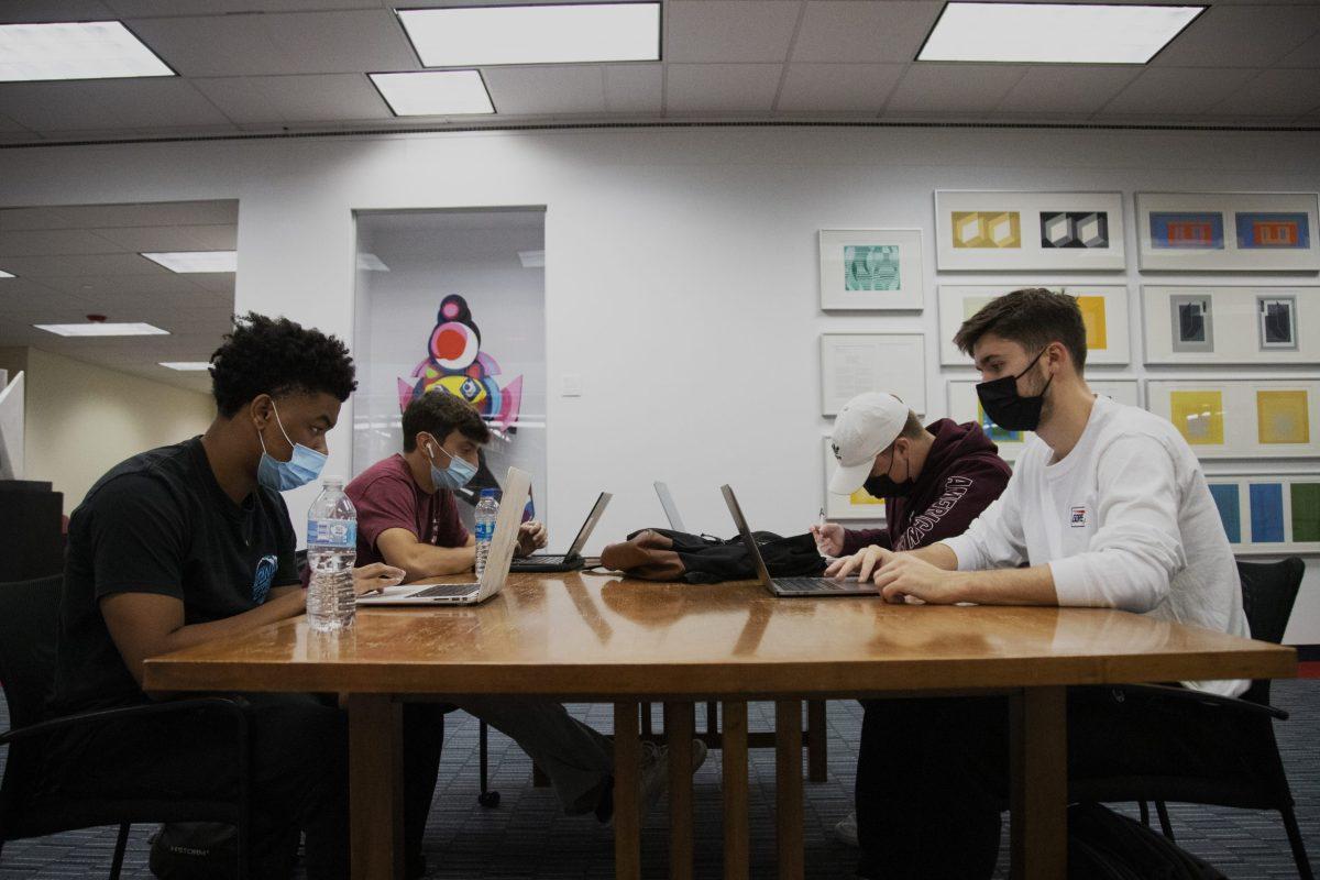 Justin McGee ’23, Steven Tantillo ’24, Peter Paino ’23 and Andre Hatcher ’23 study for midterms.
PHOTO: KELLY SHANNON ’24/THE HAWK