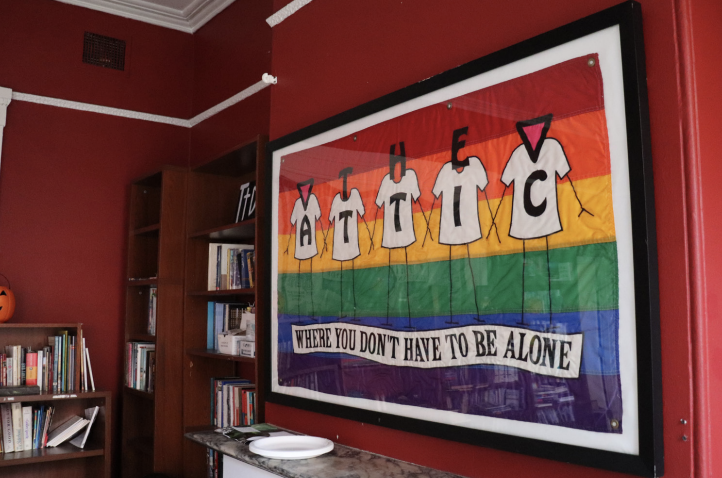 The Attic’s rainbow flag framed inside one of the rooms in the building.
PHOTO: ALLIE MILLER ’24/THE HAWK