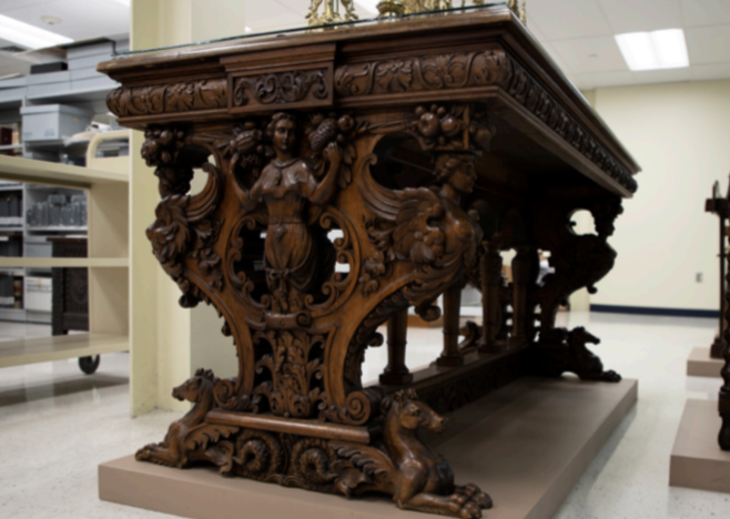 Italian Neo-Renaissance library table in the SJU Archives.
PHOTO: KELLY SHANNON ’24/THE HAWK