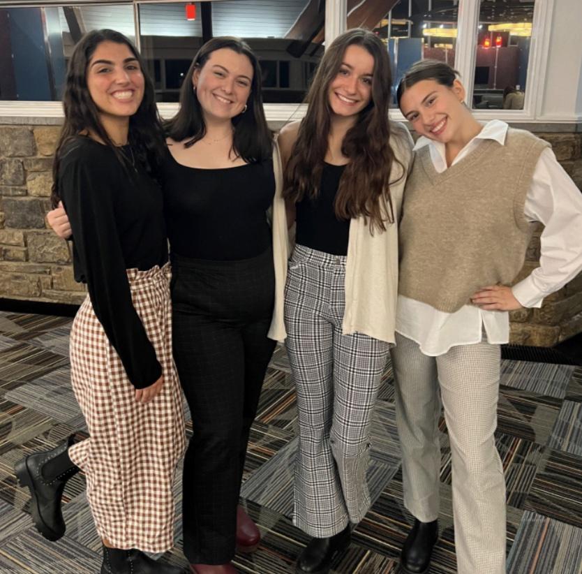 The Student Council for Exceptional Students eboard, from left to right Olivia DeLorenzo ’25, Caitlin Mar-
quad ’25, Rachel Bacon ’25, and Claire Kenny ’25, at one of their events.

PHOTO COURTESY OF RACHEL BACON ’25