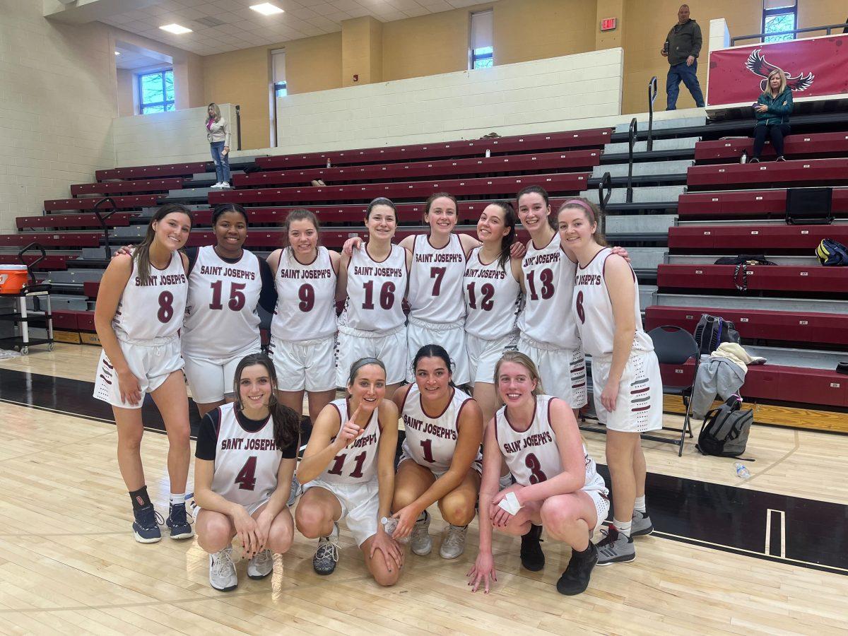 Women's club basketball poses for a group photo after a game. PHOTO COURTESY OF SARAH PUZONE '25