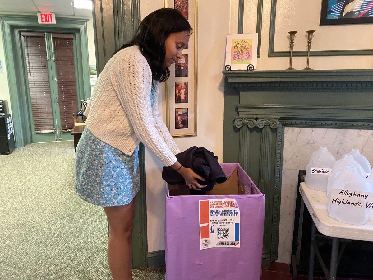 Hana Haile ’24 donating clothes that will go to Catholic Social Services of the Archdiocese of Philadelphia.
PHOTO COURTESY OF TESS COARY ’24