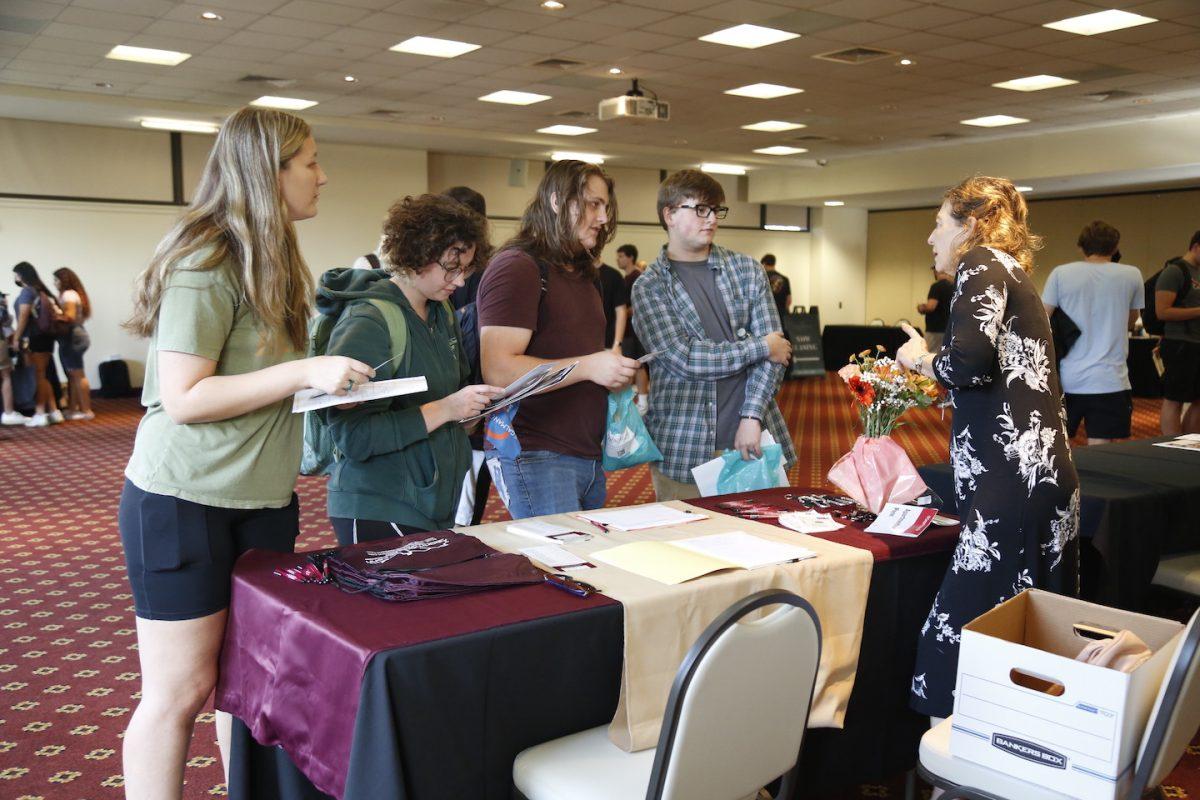 Sydney Taylor ’26, Katy Viveiros ’26, James Miller ’26 and Alex Wojciak ’26 ask questions about the Apartments at Penn at the housing fair.
PHOTO: MADELINE WILLIAMS ’26/THE HAWK
