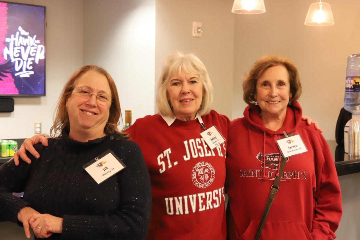 Jill Mooney ’74, Becky Staffer ’74 and Janice Chamberlin ’74 pose for a photo in Hagan Arena at the 1974 class
reunion, Feb. 10. PHOTO: LEAH CATLYN ’27