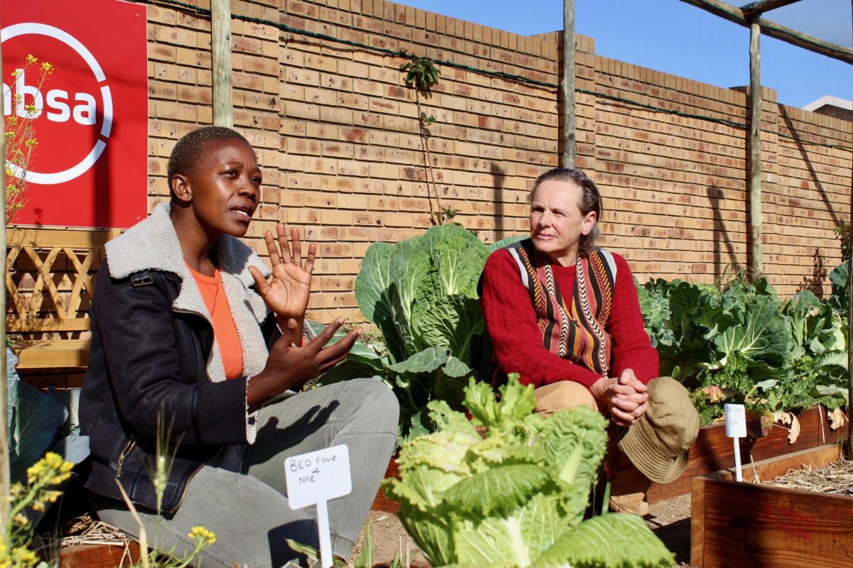 Mafusi Molefi (left) and Michèle Schiess (right) discuss one of Ma Tigers latest projects: a garden that helps feed children at Mautse Primary School. PHOTO: MAXIMUS FISHER ’25/THE HAWK