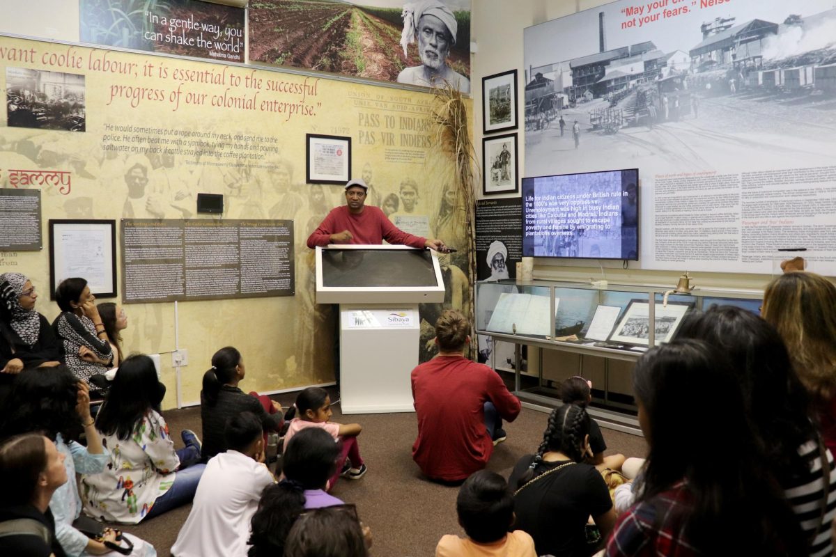 Selvan Naidoo, director and curator of the 1860 Heritage Centre in Durban, discovered evidence that his family had been among the first indentured laborers from India who were transported by the British colonial government to South Africa in the 1860s. PHOTO: KILEY O'BRIEN '25/THE HAWK