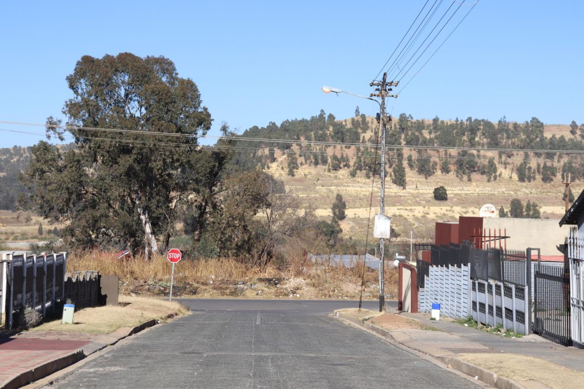 The family home of Rochelle Smith, Yolanda Spalding and Siritta Varnicker is on a street close to a tailing mountain in Riverlea. On windy days tailing dust ends up on top of and inside houses like theirs. PHOTO: ZACH PODOLNICK '26/THE HAWK