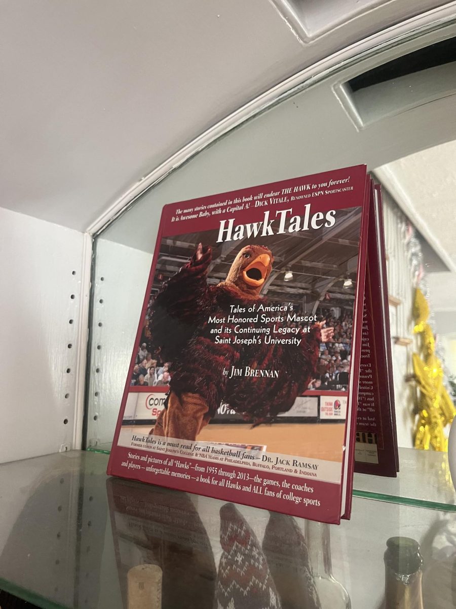 Mia Messina ’25 has the “Hawk Tales” book from Jim Brennan ’58 on the shelf in her house.
PHOTOS: MIA MESSINA ’25/THE HAWK