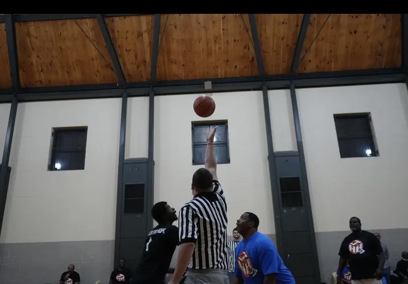 Center of Hope and Journey of Hope tip off at a Hoops 4 Hope basketball game.