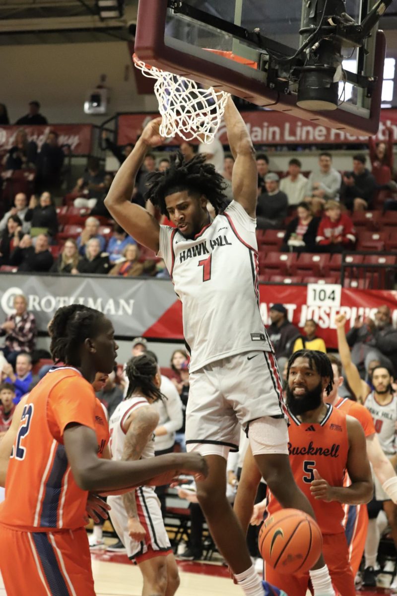 Redshirt first-year guard Dasear Haskins dunks during the exhibition game vs. Bucknell, Oct. 27.
PHOTO: LEAH CATLYN ’27/THE HAWK