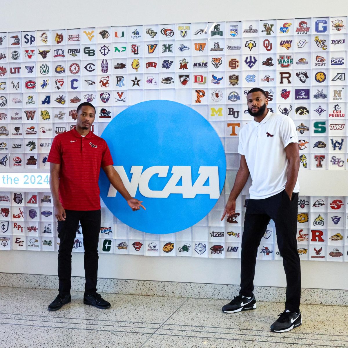 Sophomore Xzayvier Brown and assistant coach of player development Phillip Lawrence-Ricks pose at the 2024 NCAA Elite Student-Athlete Symposium for Men’s
Basketball. PHOTO COURTESY OF SJU ATHLETICS