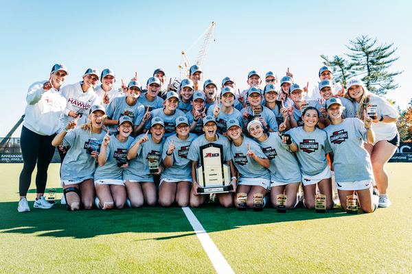 Field hockey poses with the A-10 Championship trophy following their 2-1 win over UMass, Nov. 9. PHOTOS: JOE SCHNEYDER ’12/SAY CHEEZE STUDIOS