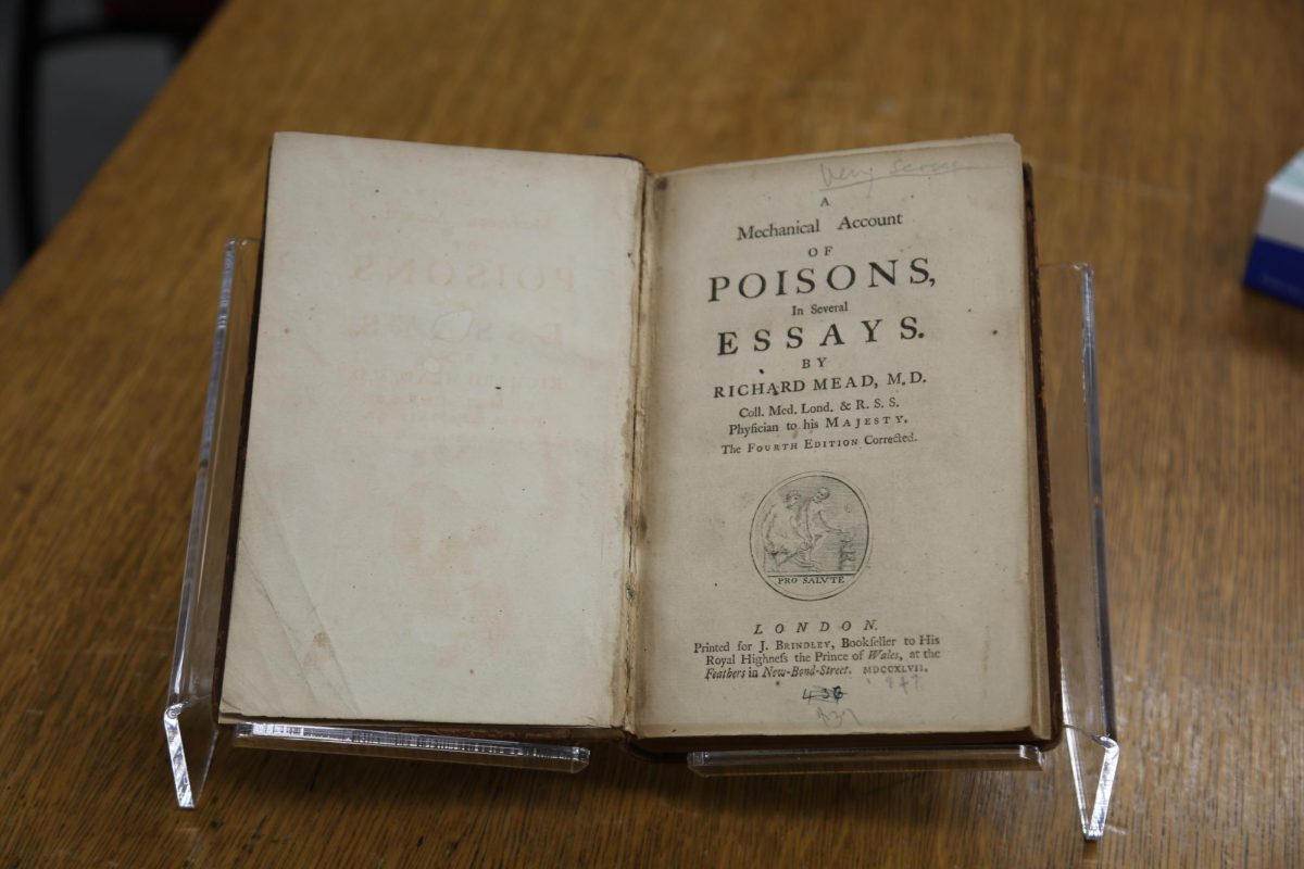 The inside cover of the book, “A Mechanical Account of Poisons in Several Essays,” located in the St.
Joe’s Archives. PHOTO: MADELINE WILLIAMS ’26/THE HAWK