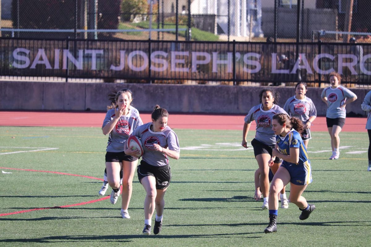 Brianna Kelly ’26 attempts to dodge Drexel defense on her way to score, Nov. 9.
PHOTO: ZACH PODOLNICK ’26/THE HAWK