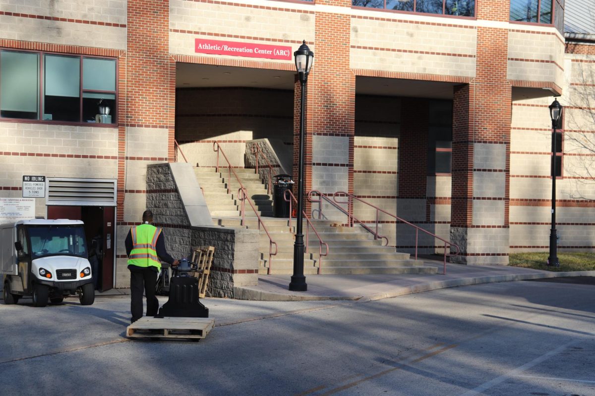 A worker wheels a wooden pallet outside the Athletic/Recreation Center (ARC), Nov. 25.
PHOTO: LUKE SANELLI ’26/THE HAWK