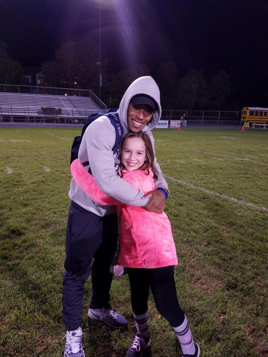 Maisey Hartman ’27 and Eagles running back Saquon Barkley afer a Whitehall High School football game, 2016.
PHOTO COURTESY OF MAISEY HARTMAN ’27