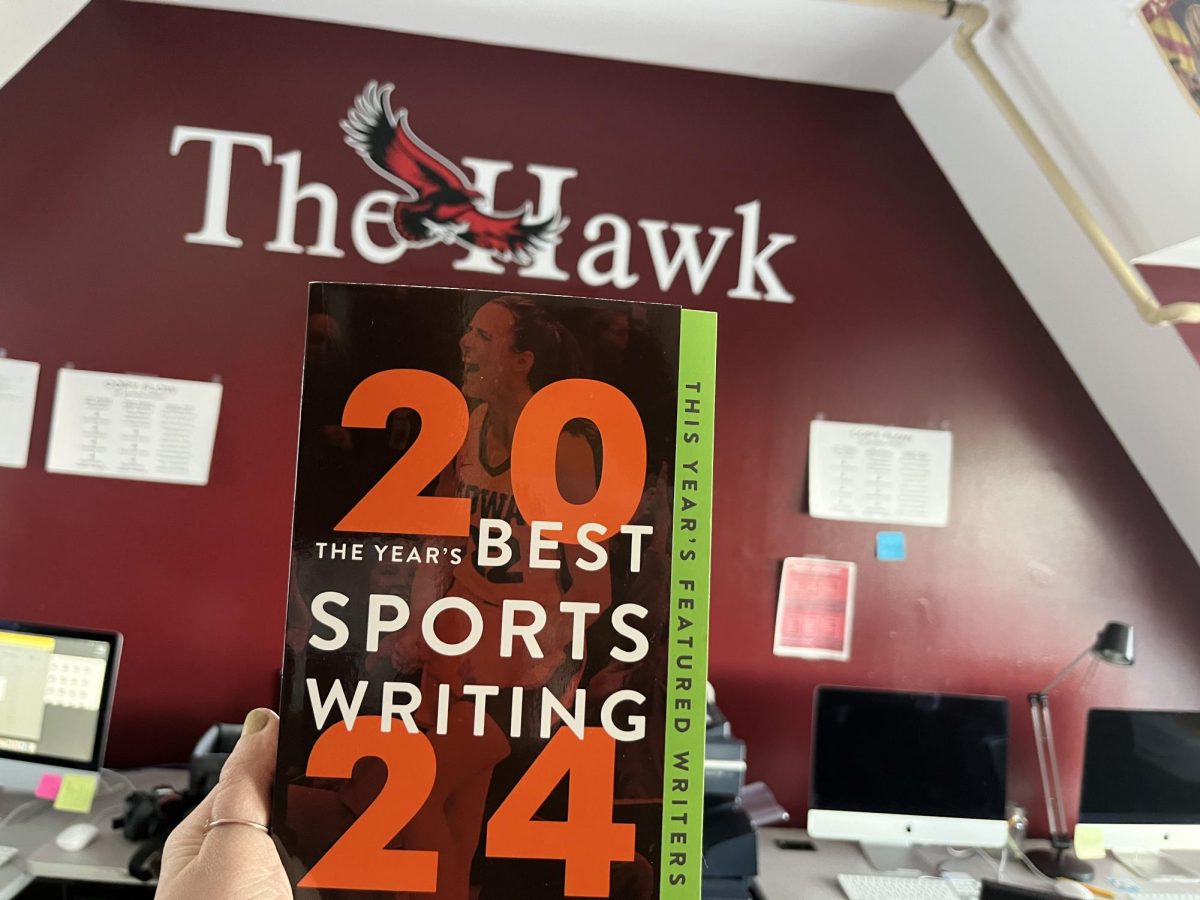 A hard copy of the 2024 edition of “The Year’s Best Sports Writing,” in which Brendan Prunty’s ’06 piece is
featured. PHOTO: MIA MESSINA ’25/THE HAWK