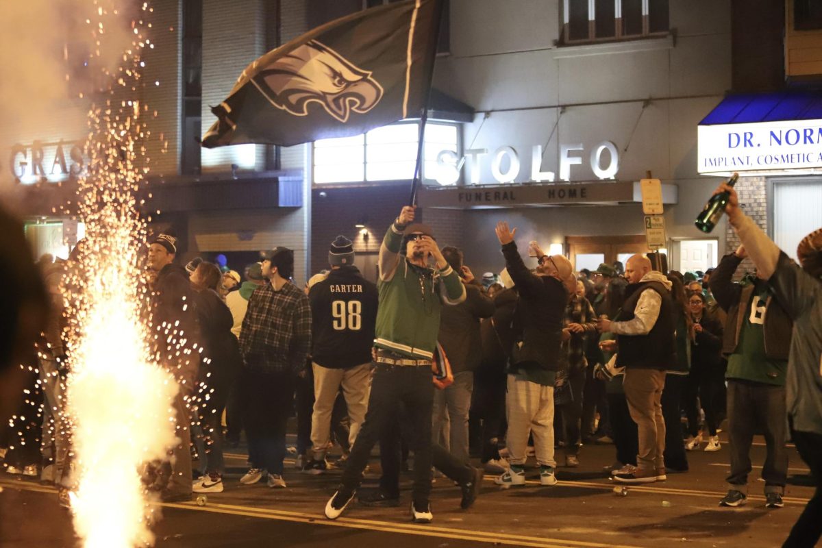 Philadelphia Eagles fans celebrate on Broad Street following the Eagles 40-22 victory over the Kansas City Chiefs in the 2025 Super Bowl, Feb. 9. PHOTO: MIA MESSINA ’25/THE HAWK