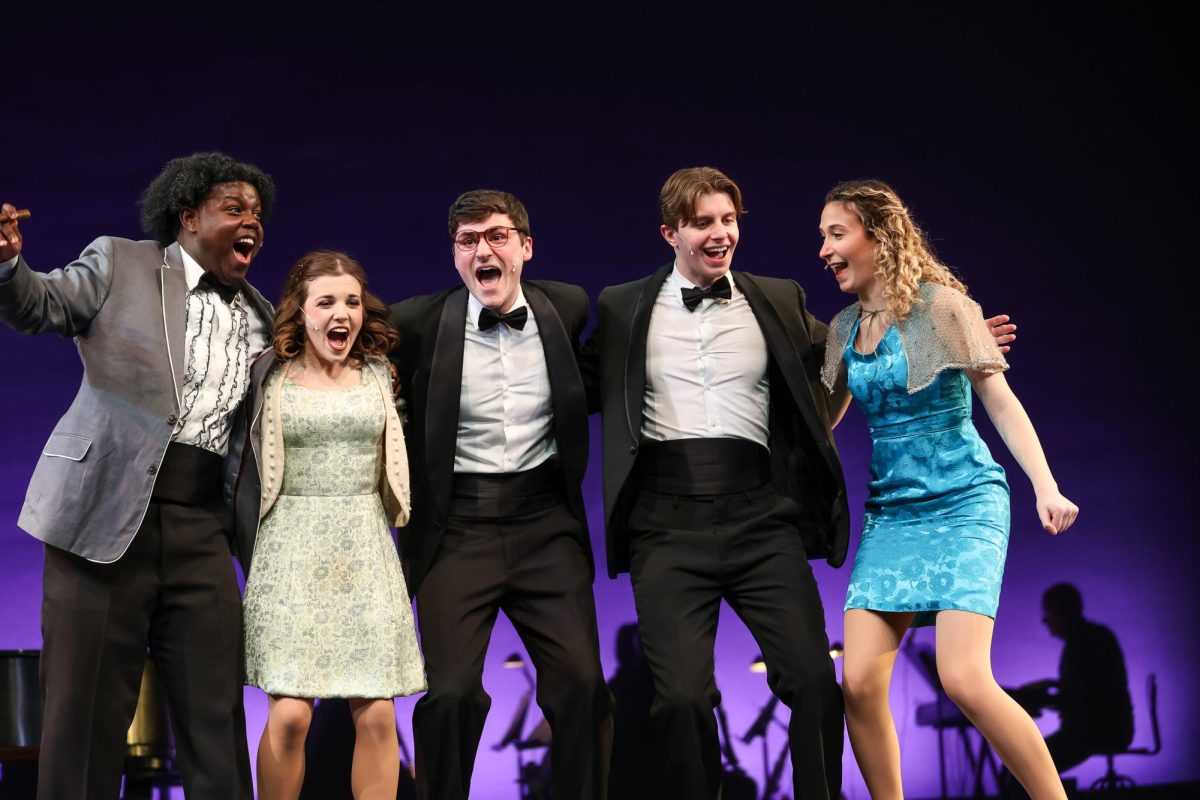 Marcus Solomon ’27, Abby Williams ’25, Robbie Whitney ’25, Fred Mader ’27 and Nell Duesler ’28 in “Merrily We Roll Along,” presented by SJU Theatre Company. PHOTO: MELISSA KELLY PHOTOGRAPHY