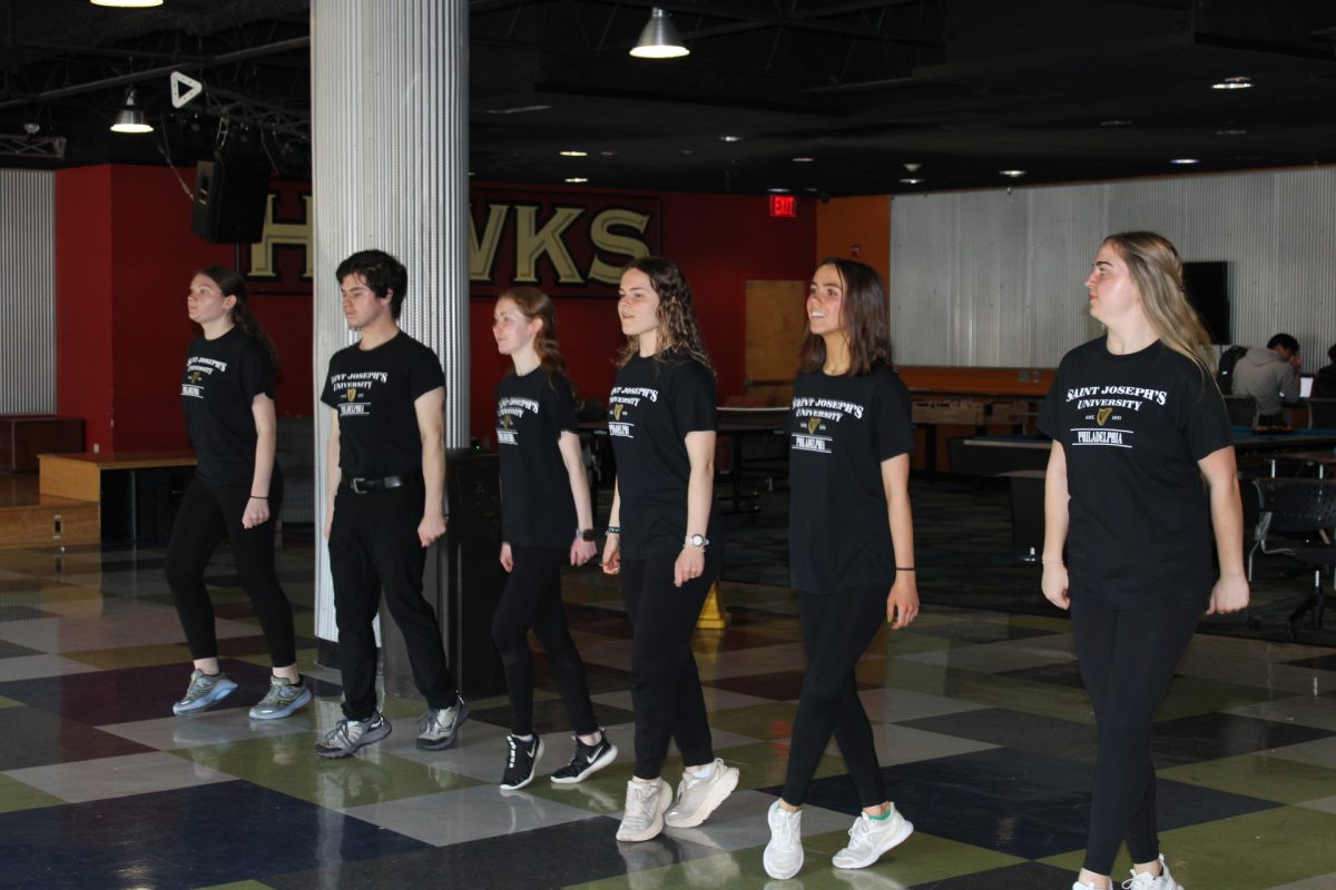 SJU Irish Dance Club performs for a crowd in The Perch, March 17.