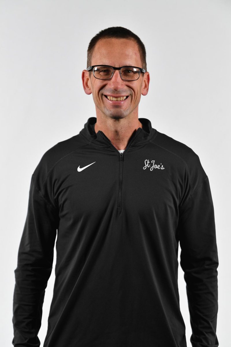 Headshot of women's rowing headcoach Kevin Gruber. PHOTO COURTESY OF SJU ATHLETICS