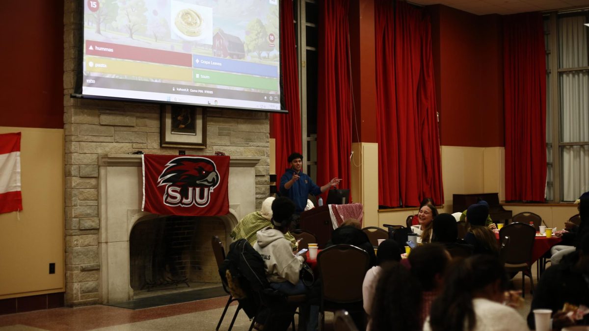 Students play a game of Kahoot at the first general meeting of the Middle Eastern Students Association, Jan. 23.
PHOTO: DEE ALABEDE '26/THE HAWK