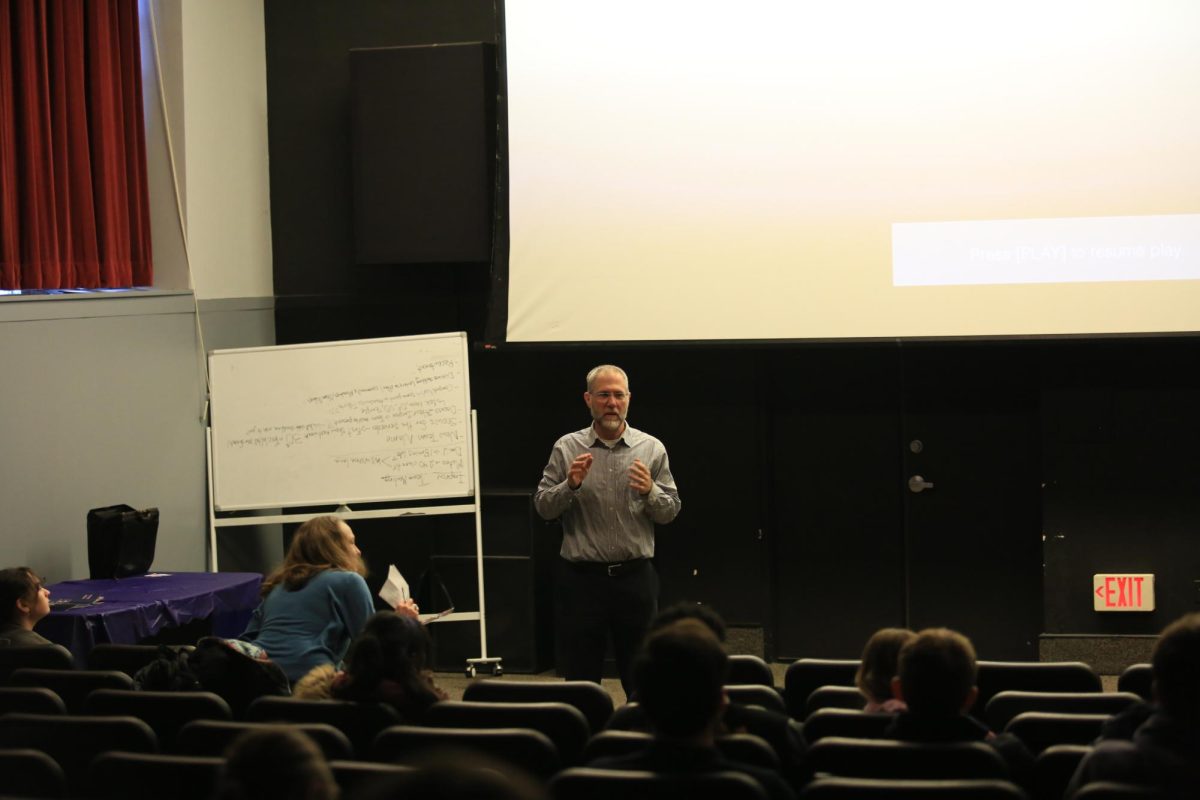 Andrew Payne, Ph.D., professor of philosophy and America250@SJU committee member, introduces the film “High Noon” to kick off the America250@SJU club’s first event. PHOTO: ZACH PODOLNICK ’26/THE HAWK