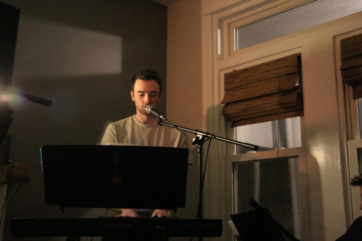 Ryan Garvey ’26 sings “Peaceful Easy Feeling” by the Eagles and plays the piano at his home. PHOTO: ZACH PODOLNICK ’26/THE HAWK