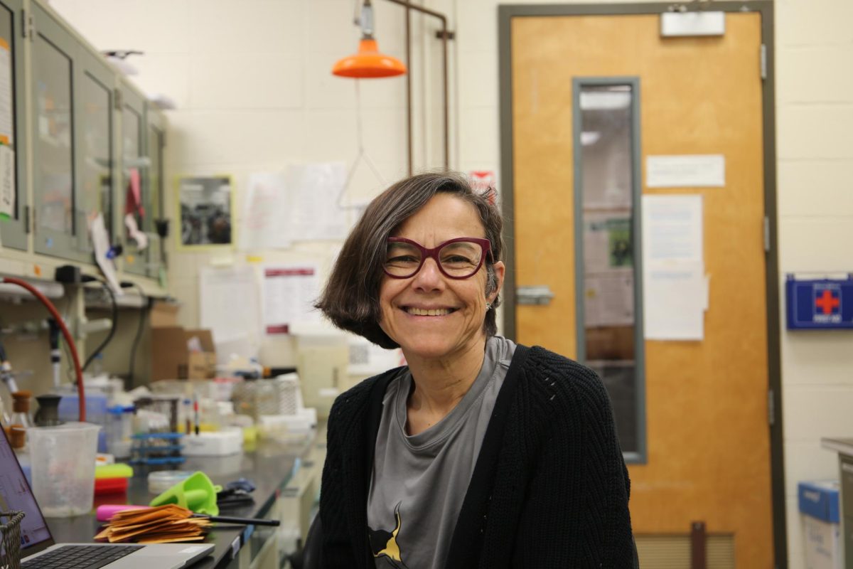 Catalina Arango Pinedo, Ph.D., smiles in her lab in the Science Center. PHOTO: ZACH PODOLNICK ’26/THE HAWK
