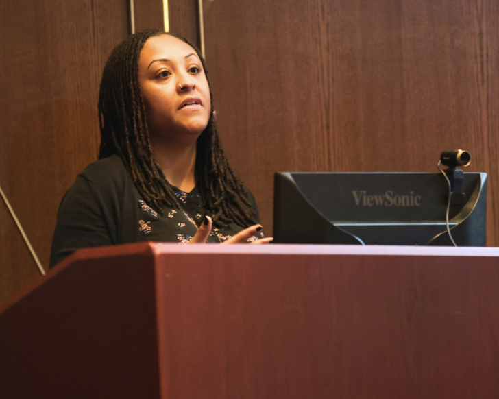 Erica Banks, Ph.D., delivers her lecture in the President’s Lounge March 20. PHOTO: DEE ALADEBE ’26/THE HAWK