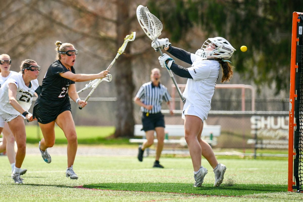 Senior midfielder Ellie Webb scores against St. Bonaventure April 4. PHOTO: MICHELE FUHRMAN